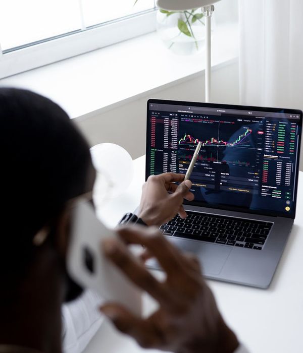 Modern trading workspace with multiple monitors