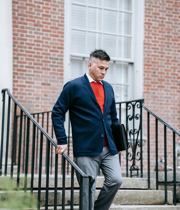 Professional man in contemporary business wear with focused expression